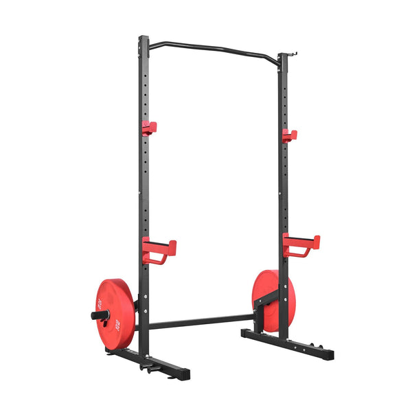 Berry Charmz power cage squat rack with adjustable J-hooks, safety bars, band pegs, and barbell for home gym strength training.