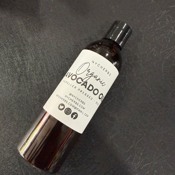 NYC Herbs® Avocado Oil in 4 oz bottle, rich in vitamins A, D, and E, shown in a clear glass bottle with a green label.
