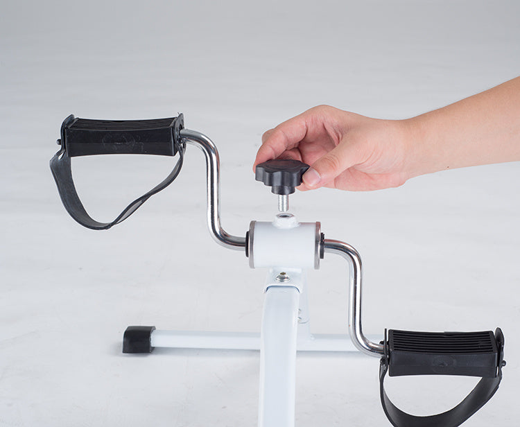 Foldable portable pedal exerciser by FLIPSTYLEZLLC showing compact mini bicycle for indoor leg fitness workouts