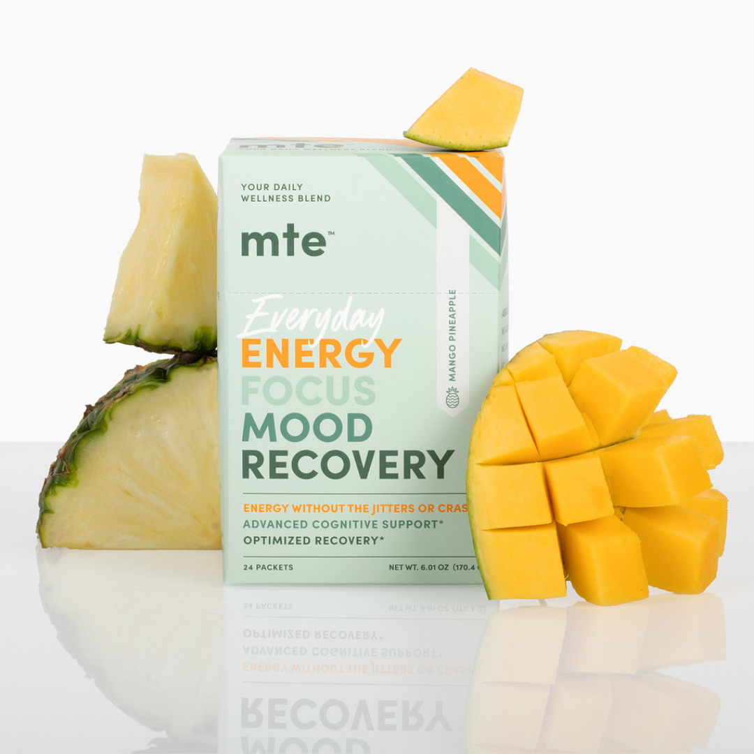 GetMTE More Than Energy powder in a container, featuring bright orange packaging and the product label visible.