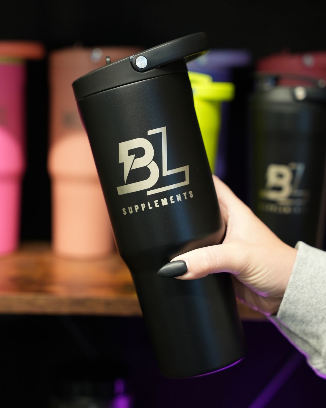 Blacklabel Supplements HydroJug 32 oz. sports cup with ergonomic handle and leak-proof lid, ideal for hydration during workouts