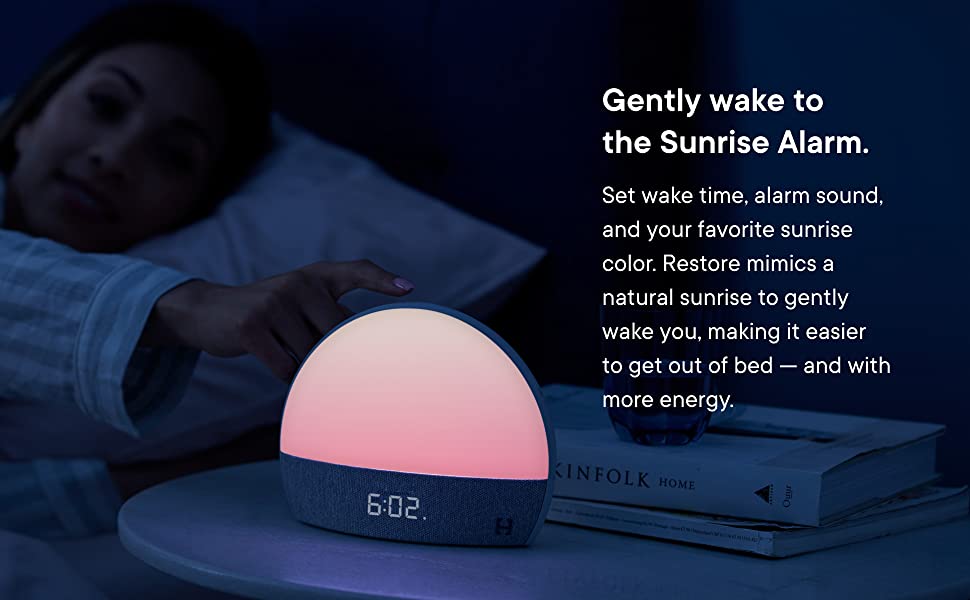 FLIPSTYLEZLLC Hatch Restore smart clock with small night light, baby monitor, white noise, and sleep ambiance features in white.
