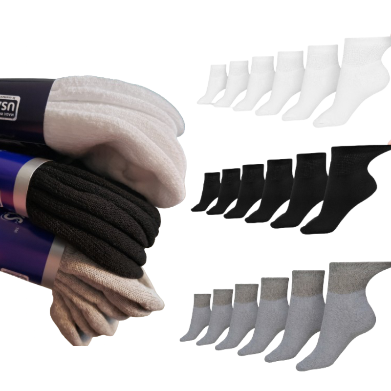 Pair of DSC women's cotton diabetic ankle socks in white, designed for comfort and circulation, shown laid flat.
