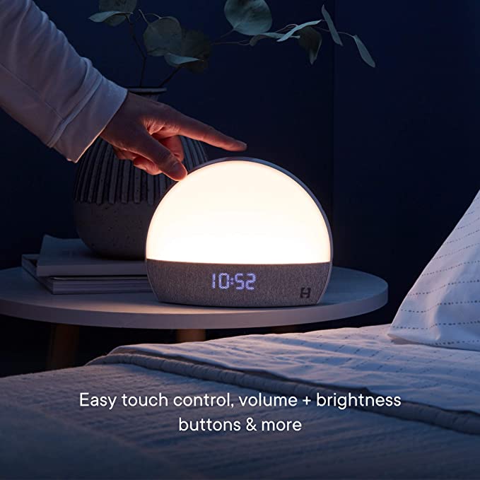 Flipstylez LLC Hatch Restore smart clock with night light, baby audio monitor, and white noise for sleep aid and soothing atmosphere.