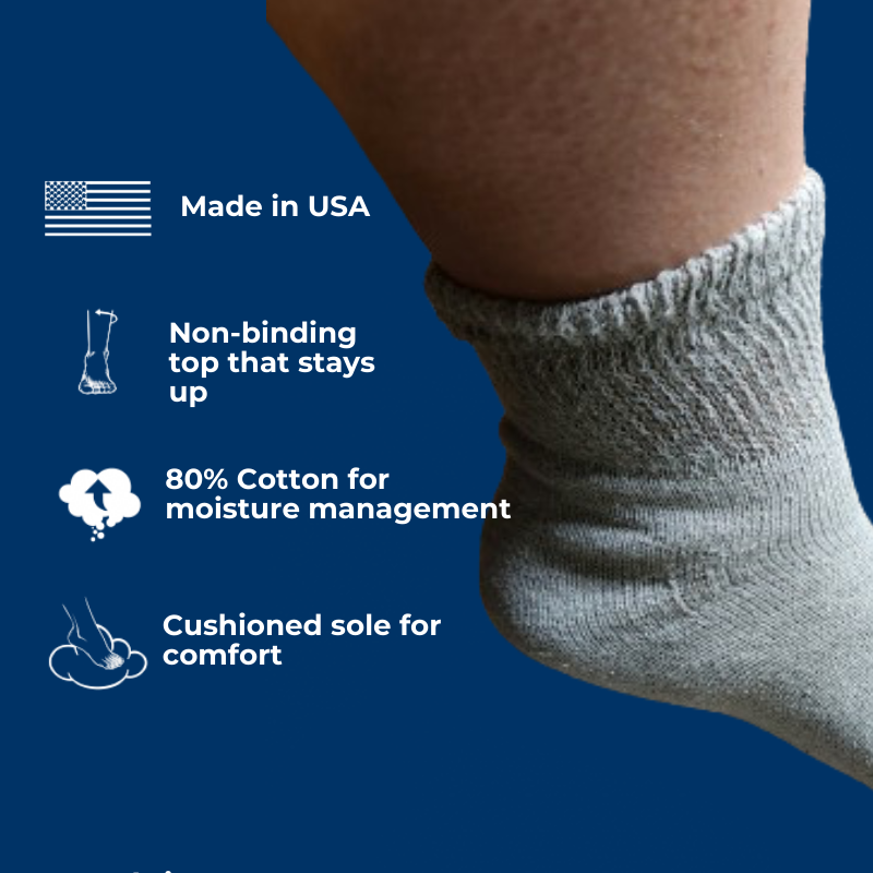 Pair of DSC women's cotton diabetic ankle socks in white, shown laid flat with comfortable, seamless design for sensitive feet.