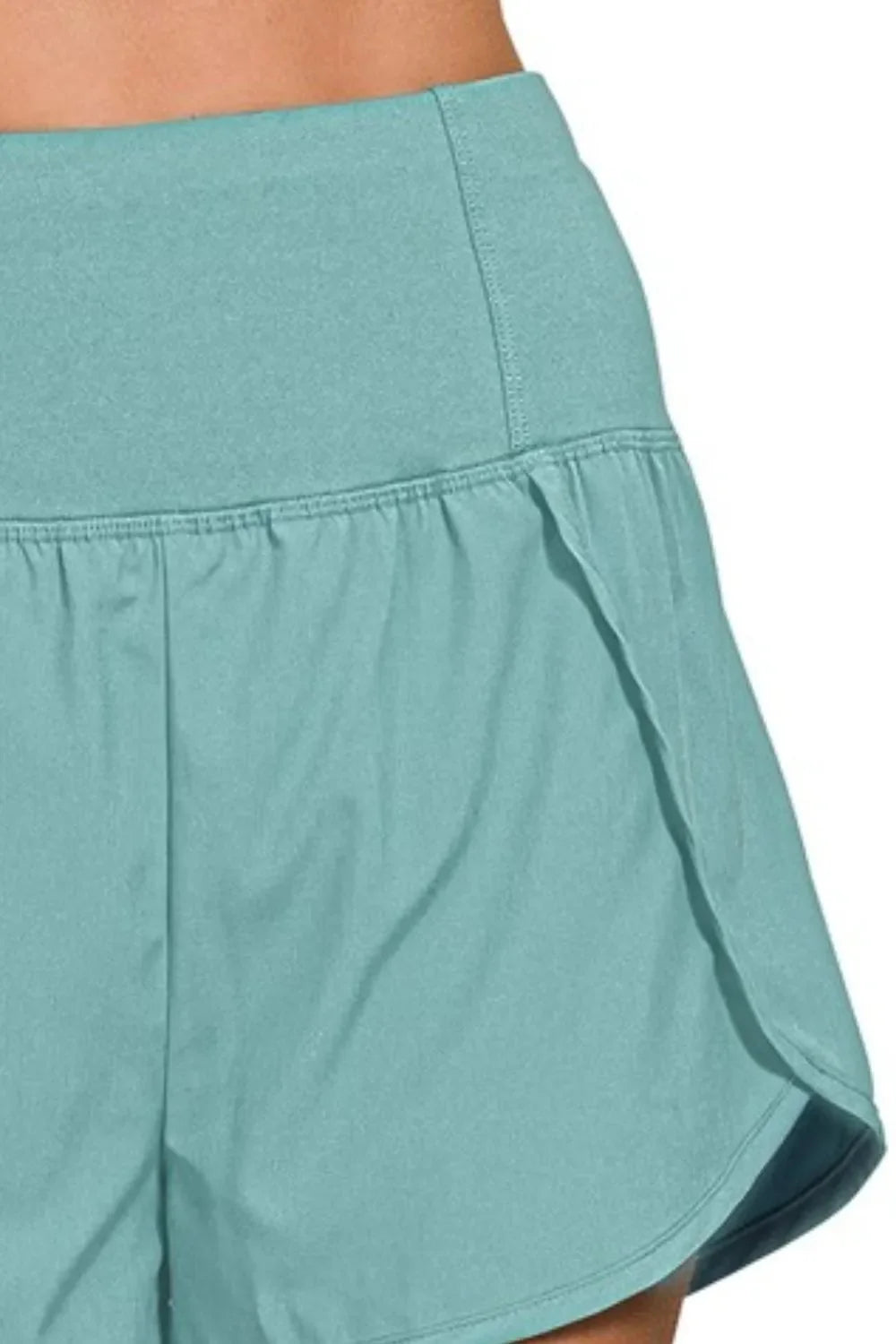 Berry Charmz Zenana high-waisted running shorts with zippered back pocket and athletic design, ideal for active wear.