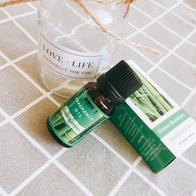 Essential oil bottle for aromatherapy by FLIPSTYLEZLLC, featuring plant-based essential oil with a clear label and dropper cap.