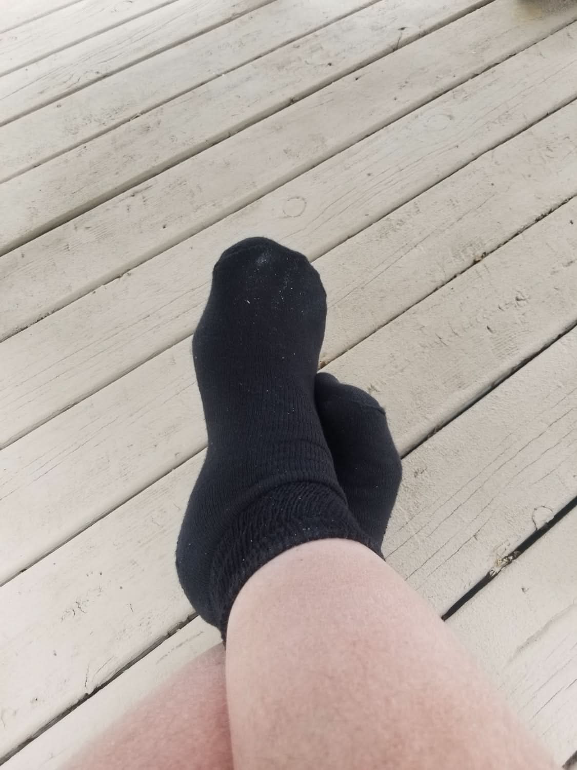 Pair of DSC women's cotton diabetic ankle socks in white, designed for comfort and circulation, shown in a close-up image.