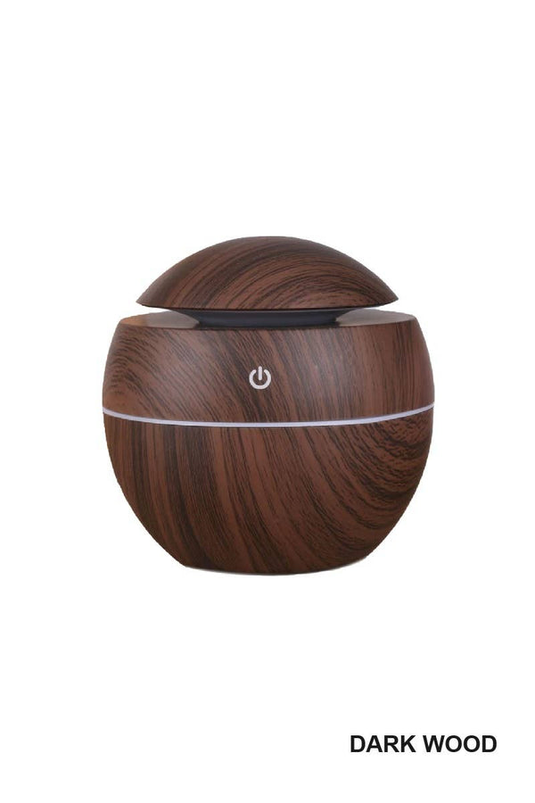 BioWizdom Tik Tok Ultrasonic Humidifier and Aroma Therapy Diffuser showing compact design with mist output and control panel.