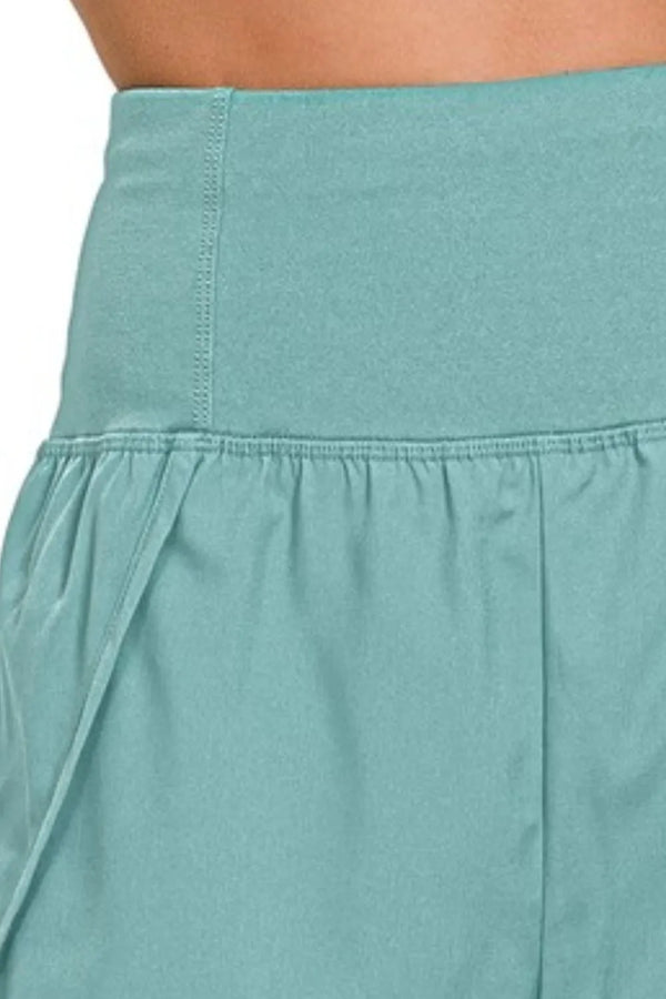 Berry Charmz Zenana high-waisted running shorts with zippered back pocket, made for comfort and active wear.