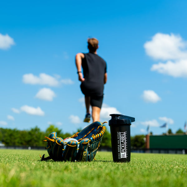 BlackLABEL Supplements 28 oz shaker bottle with leak-proof lid and ergonomic design for mixing protein shakes and supplements.