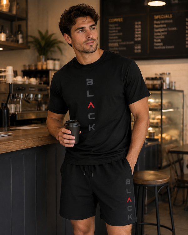 Men's black letter print summer short set by THRIXINE, featuring a casual short-sleeve shirt and shorts ensemble.