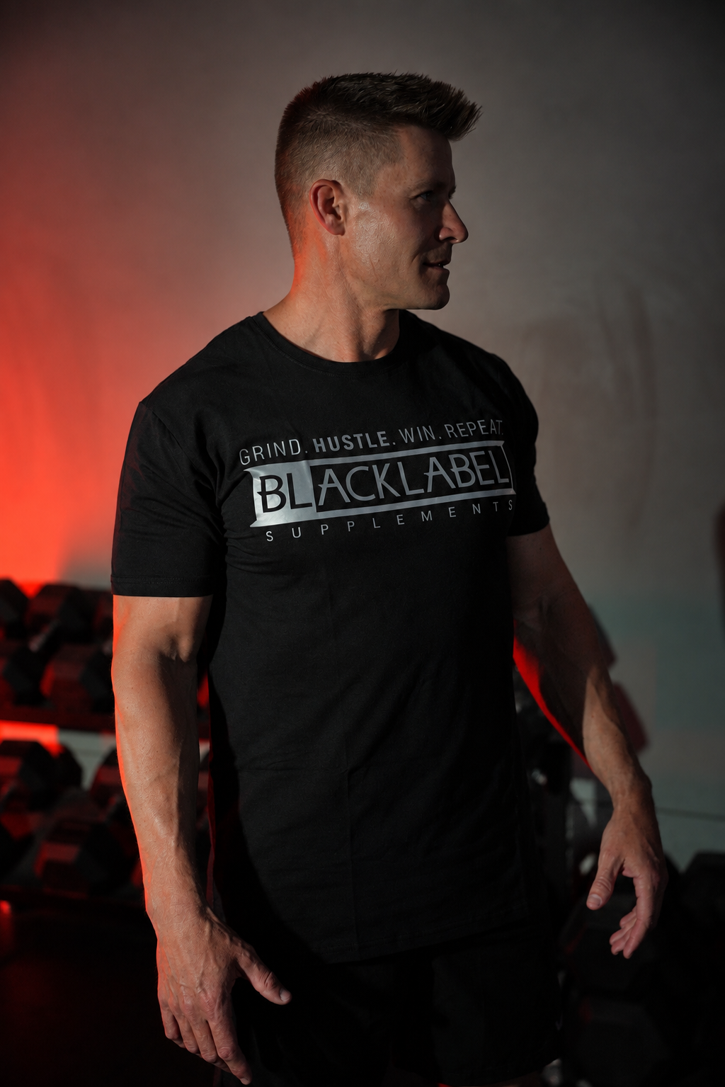 Black LABELBLACKLABEL Supplements black logo T-shirt featuring a prominent front logo design and casual fit.