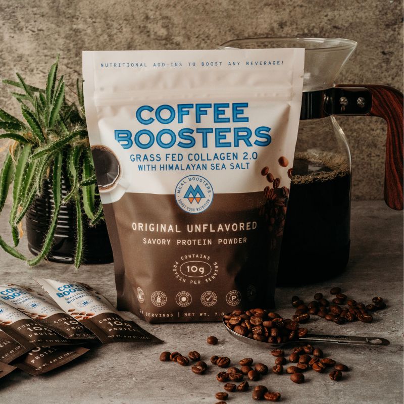 Unflavored collagen and electrolytes coffee booster protein powder mixed into brewed coffee for a healthy energy boost.