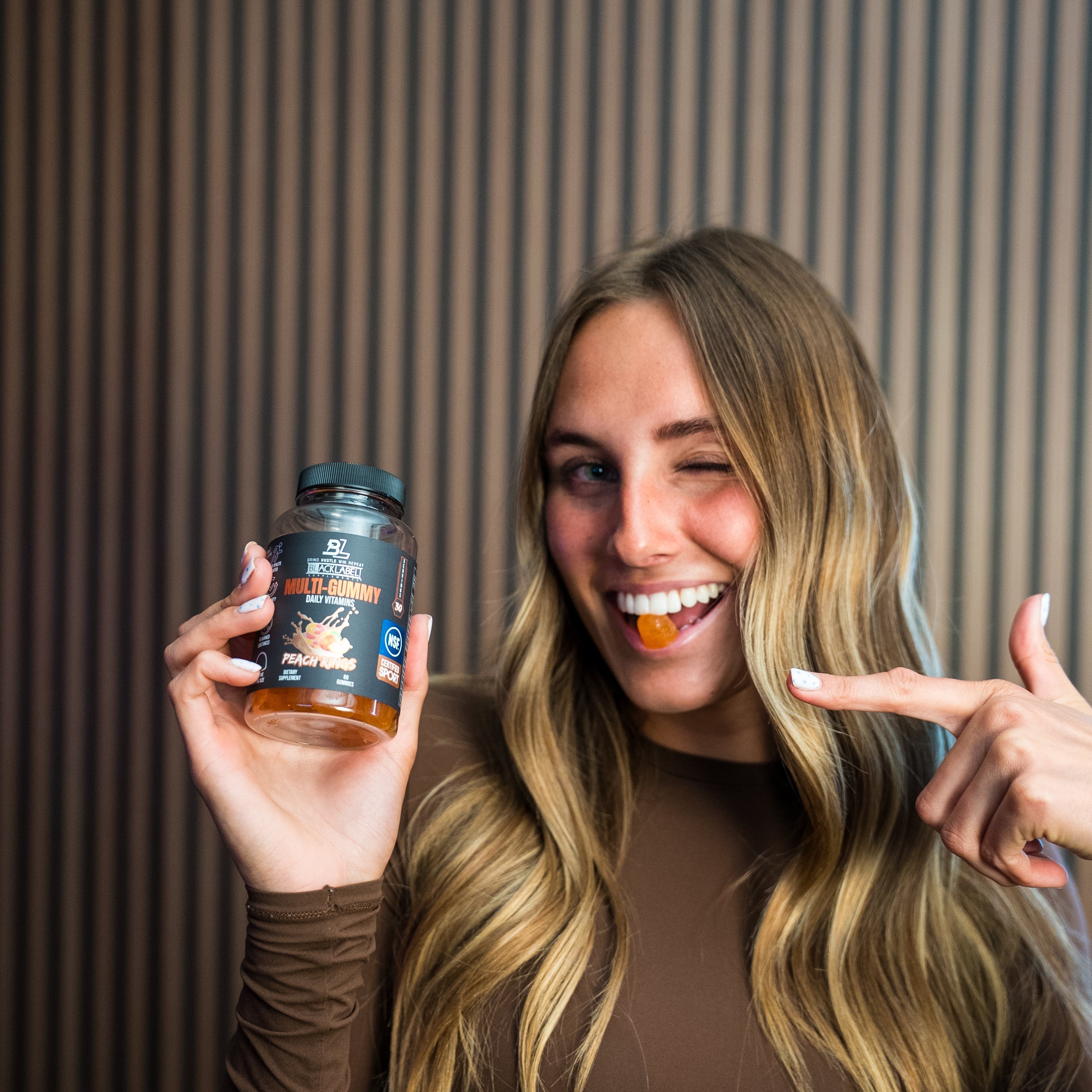 Colorful BLACKLABEL Supplements Multi Gummy with various fruit flavors, showing a variety of vibrant, chewy gummy vitamins.