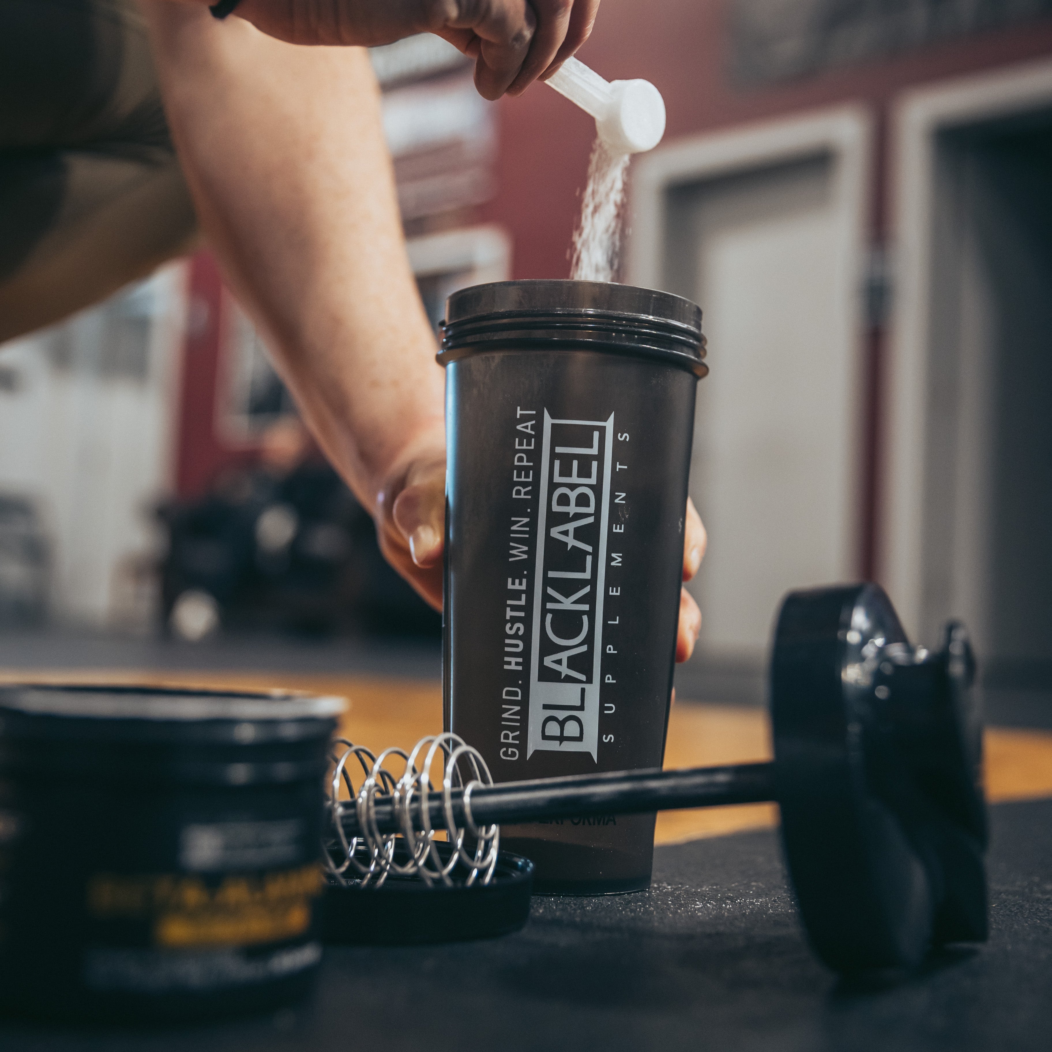 Blacklabel Supplements 28 oz shaker bottle with leak-proof lid and ergonomic design for easy mixing and on-the-go use.