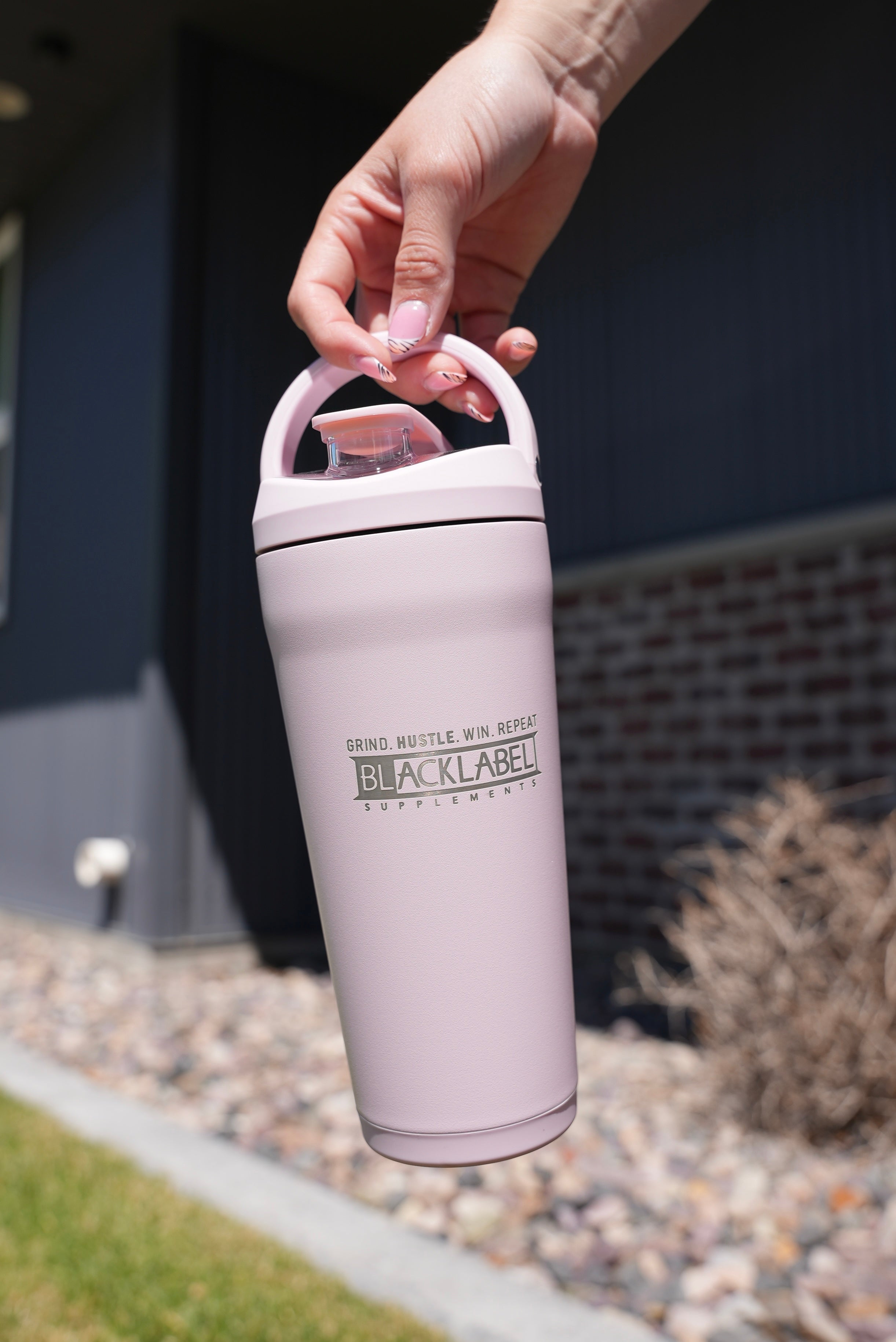 BlackLabel Supplements HydroJUG 24 oz. insulated shaker bottle with leak-proof lid and ergonomic handle for gym and outdoor use