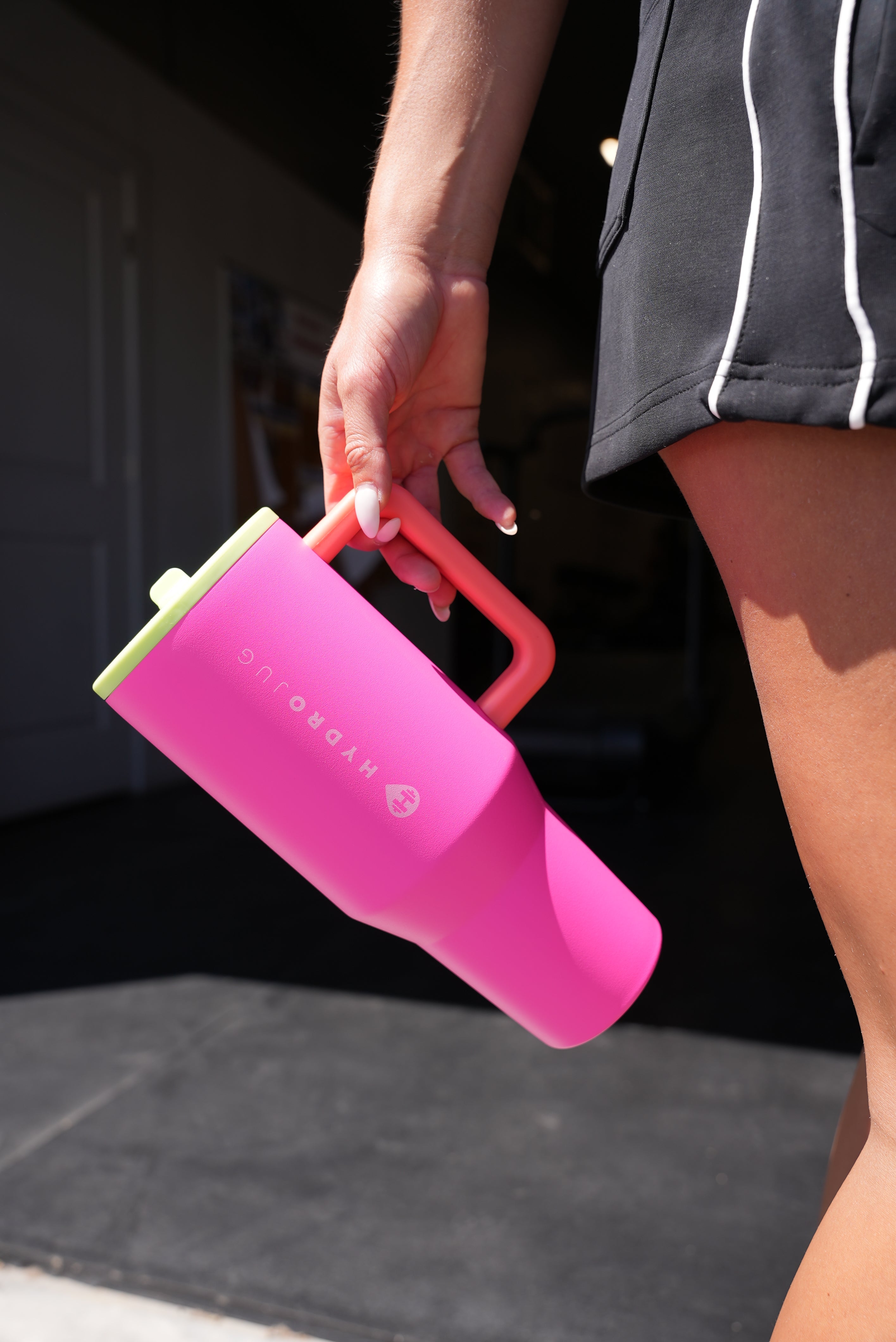 BlackLabel Supplements HydroJug 40 oz. traveler water bottle with leak-proof lid and ergonomic handle for on-the-go hydration.
