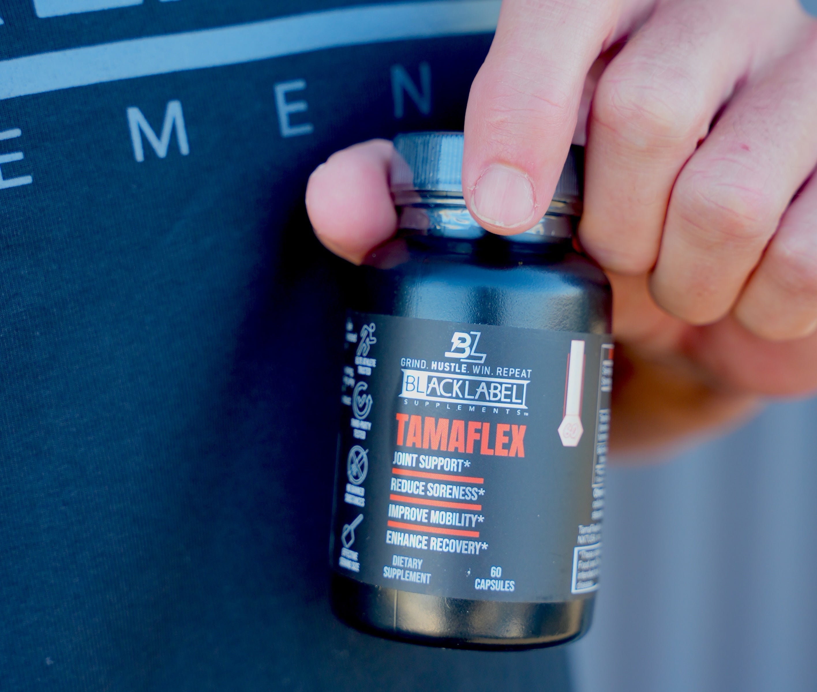 BlackLabel Supplements HEALTH & WELLNESS STACK with various supplement bottles and capsules on a white background.