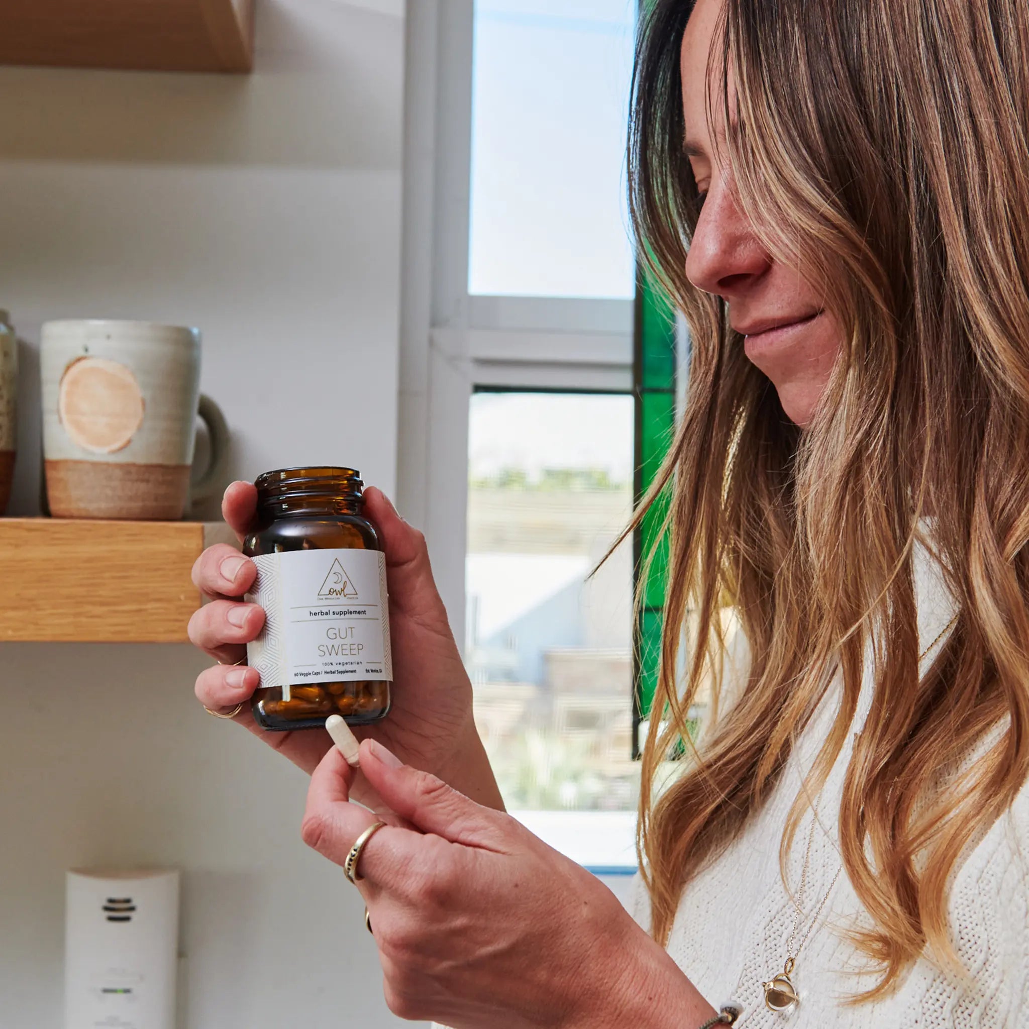 OWL Venice 1-Week Gut Sweep Reset cleanse supplement bottle with label and capsules, designed to support digestive health.