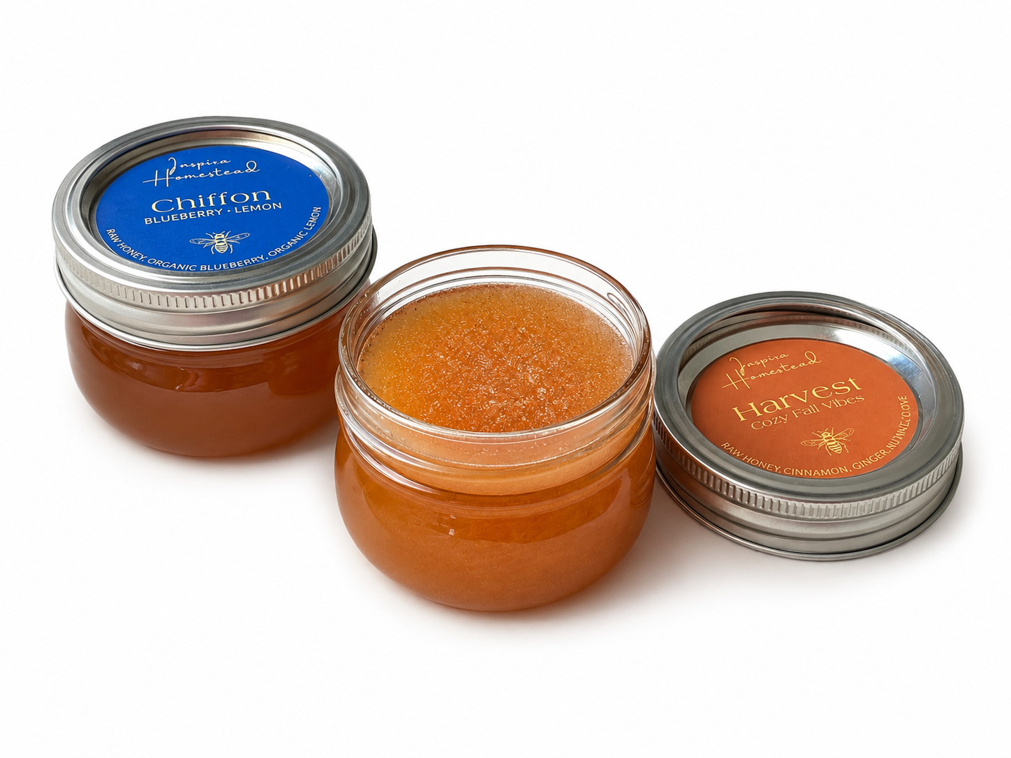 Inside view of Inspira Homestead Southern Honey Gift Set with jars of honey and related products arranged attractively.