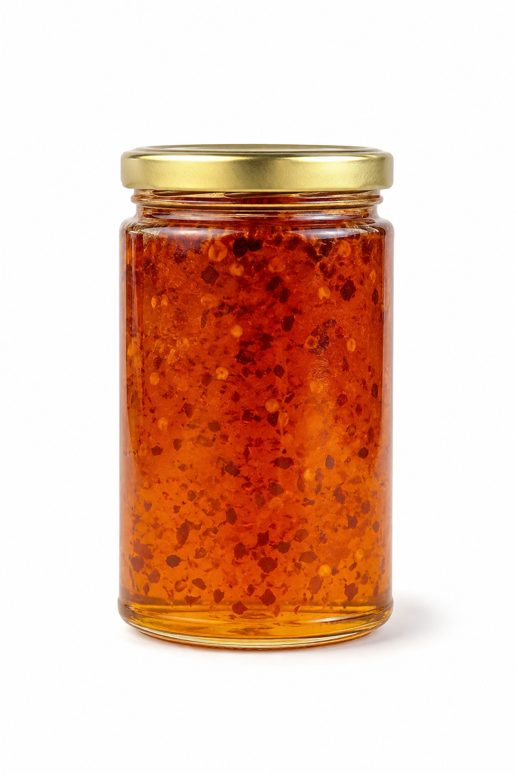 Spoonful of Inspira Homestead hot honey drizzled over toast, showcasing the fiery, golden honey with chili flakes for added spice.