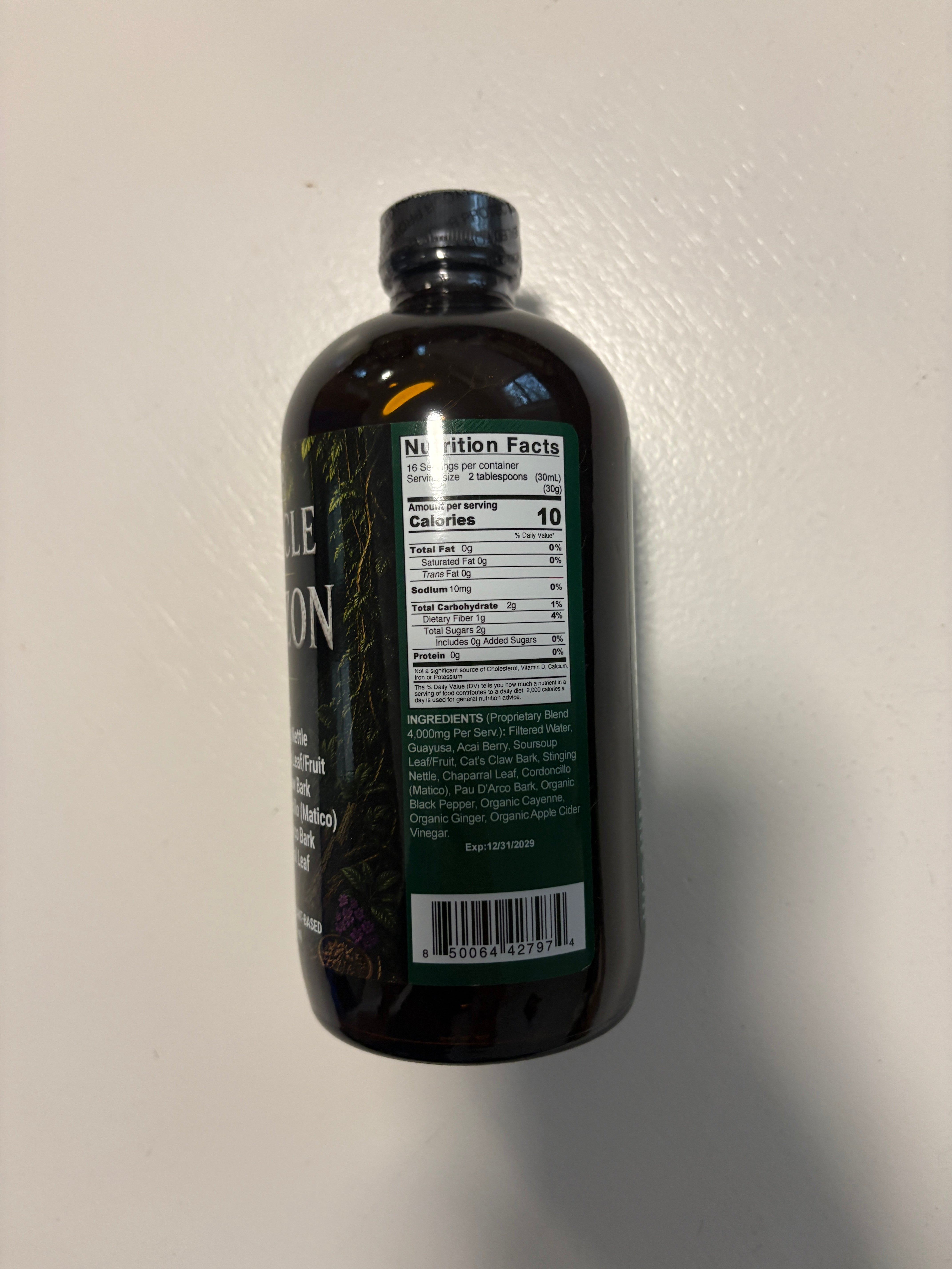 Vegan herbal liquid supplement in a dropper bottle labeled Miracle of Amazon by VeggieVerve, showing fresh herbs and natural ingredients.