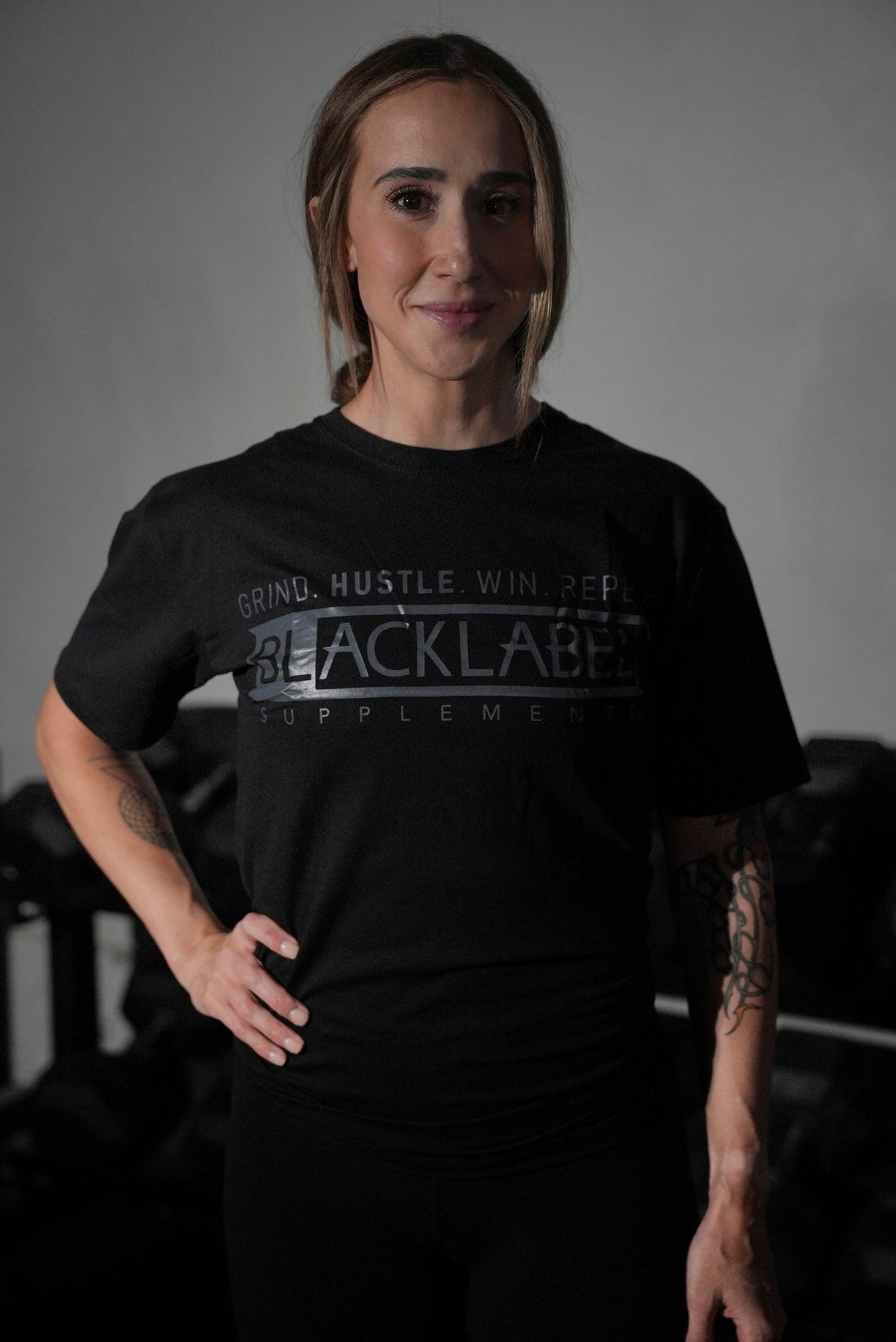 BlackLABEL Supplements Black Logo T-Shirt featuring a black fabric with prominent black logo print on front.