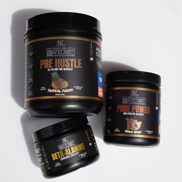 BlackLabel Supplements Performance Stack with Pre Hustle, Pure Power, and Beta-Alanine jars, black containers with orange and yellow labels.