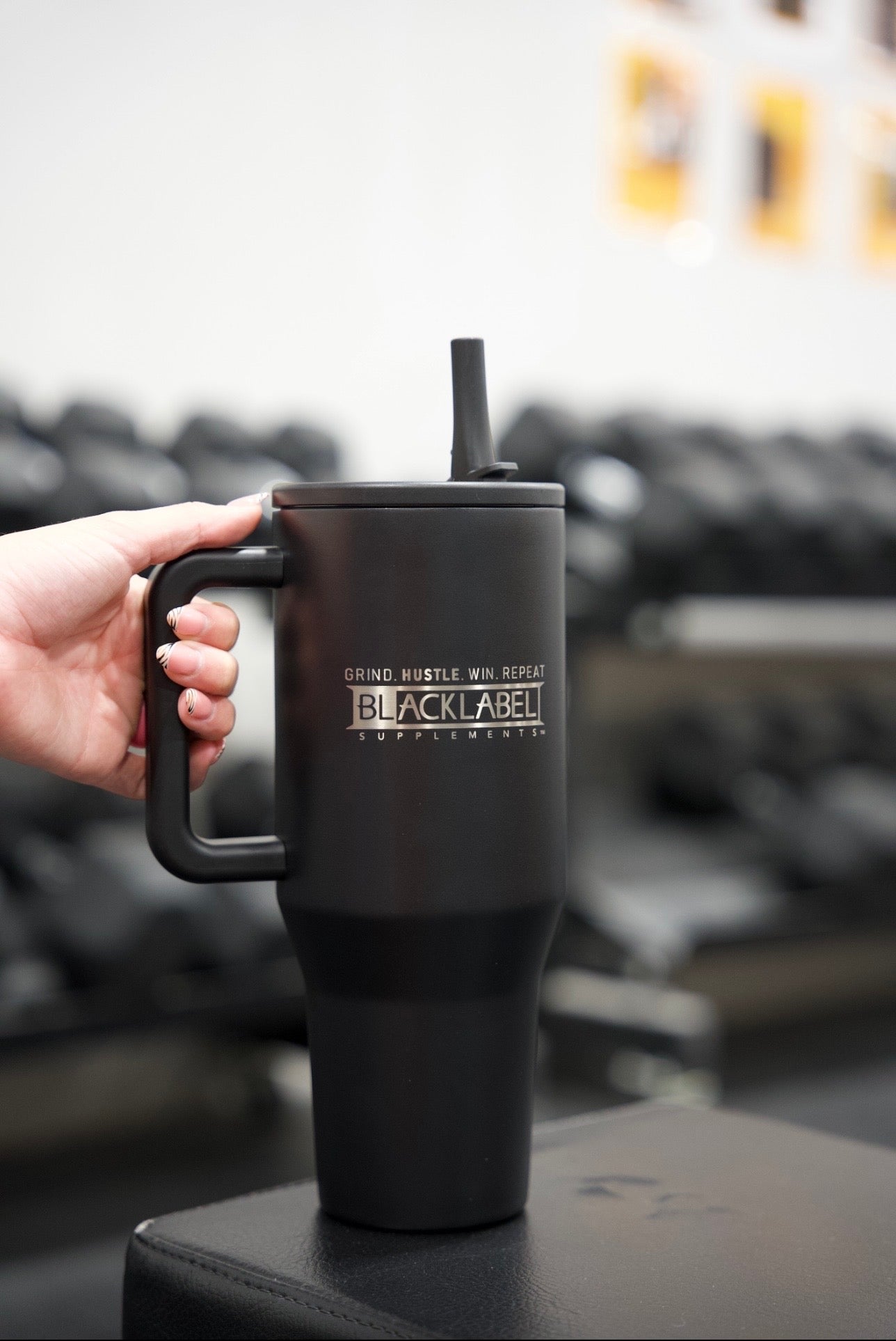 BlackLabel Supplements HydroJug 40 oz. traveler water bottle with ergonomic handle and wide mouth for easy filling and pouring.