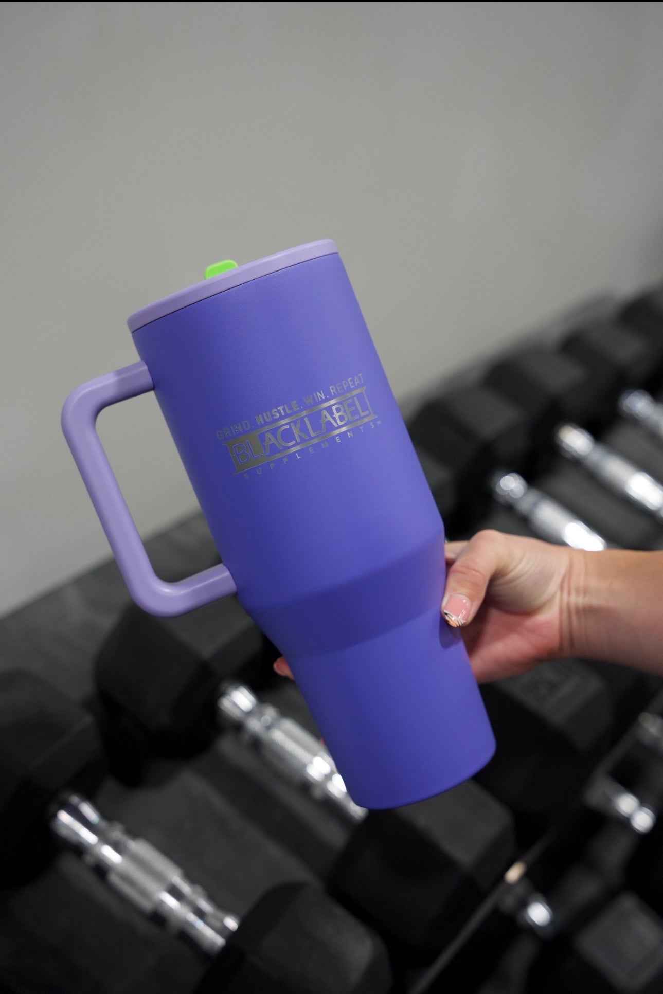 BlackLabel Supplements HydroJug 40 oz. travel water bottle with ergonomic handle and leak-proof lid, ideal for hydration on the go.