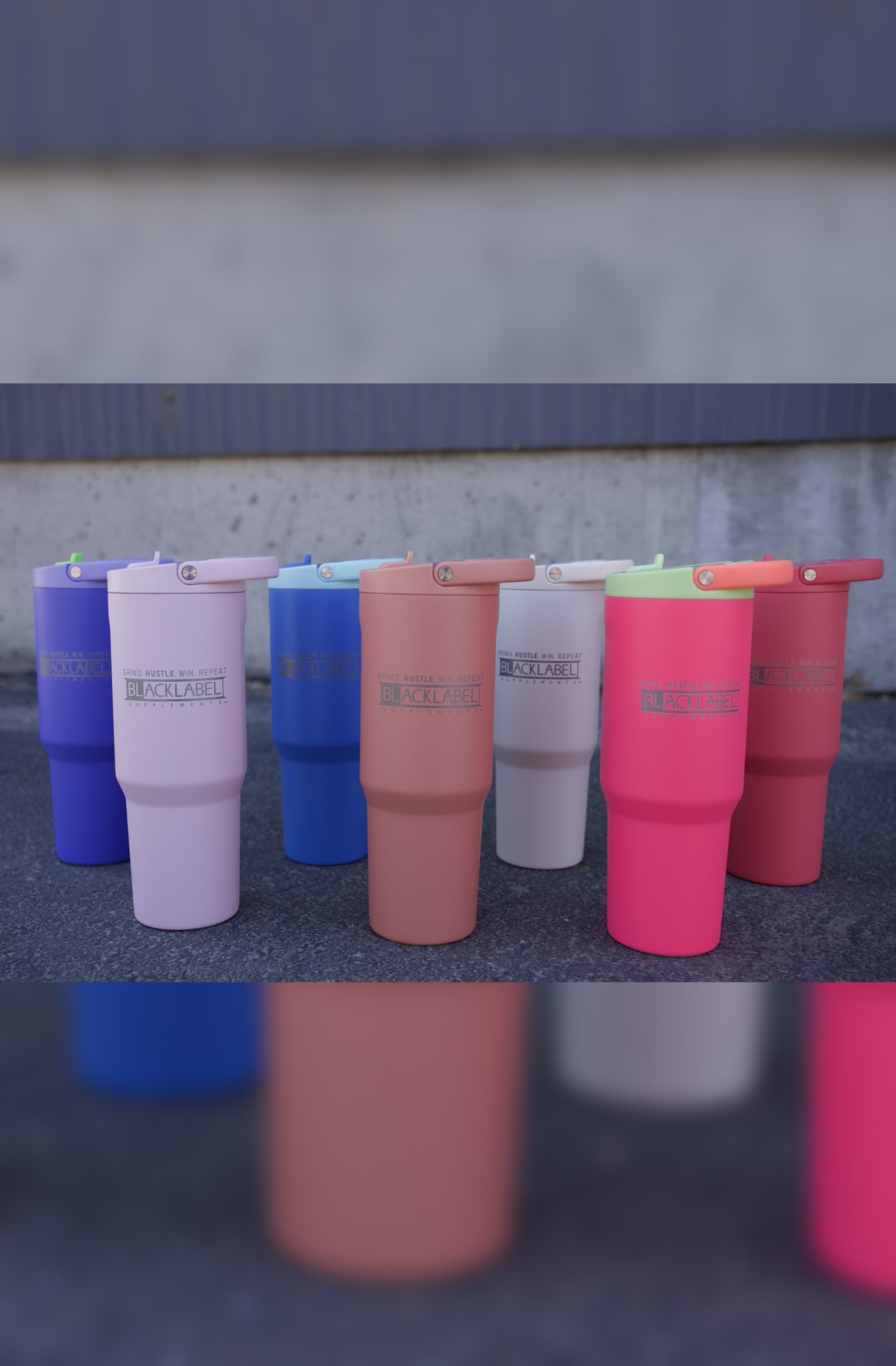 BlackLabel Supplements HydroJug 32 oz. sport cup with a durable handle and leak-proof lid, ideal for hydration during workouts.