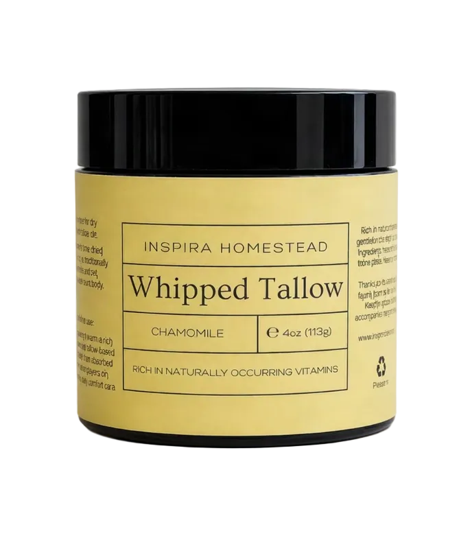 Creamy whipped grass-fed tallow from Inspira Homestead, showing a smooth, white spread in a jar.
