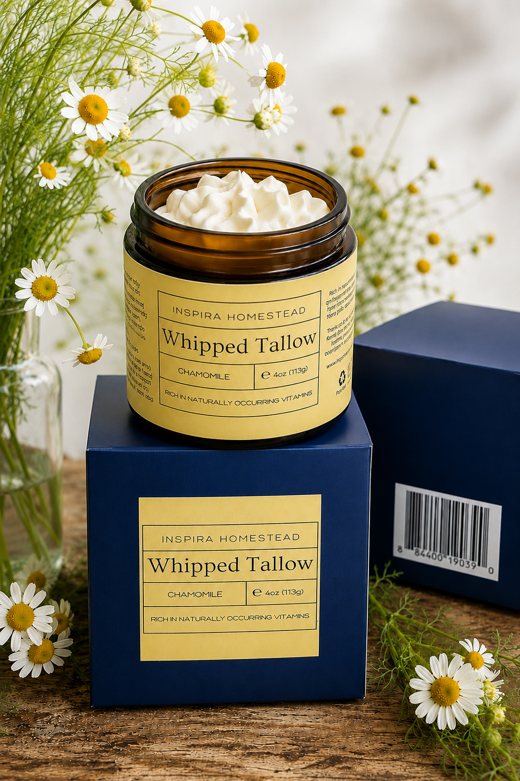 Creamy whipped grass-fed tallow in a branded container, showcasing a smooth, natural texture from Inspira Homestead.