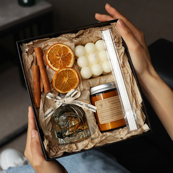 FLIPSTYLEZLLC aromatherapy candle gift box with assorted candles, relaxing atmosphere, and elegant packaging.