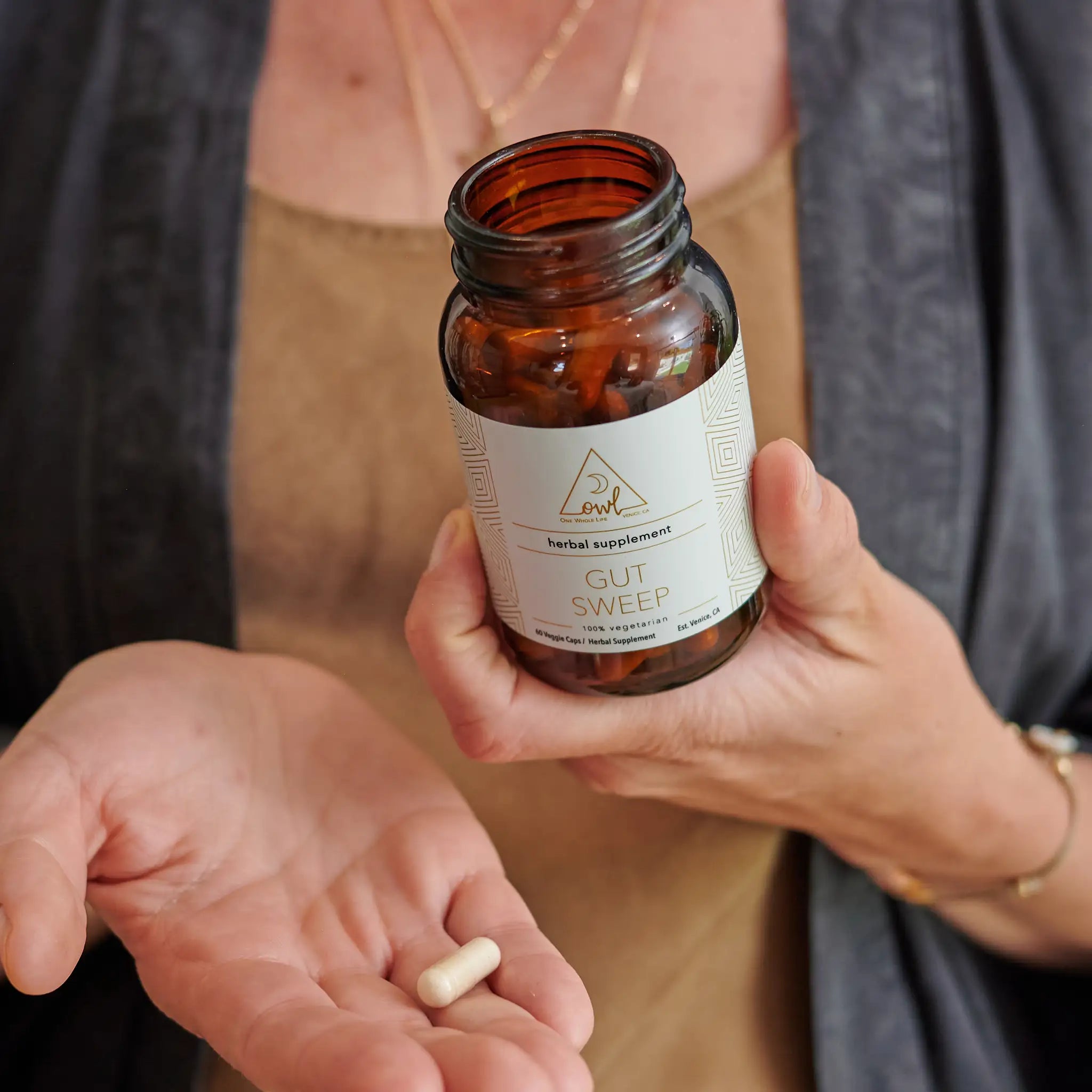 OWL Venice Gut Sweep herbal digestive wellness capsules featuring aloe vera, marshmallow root, and slippery elm in a bottle.