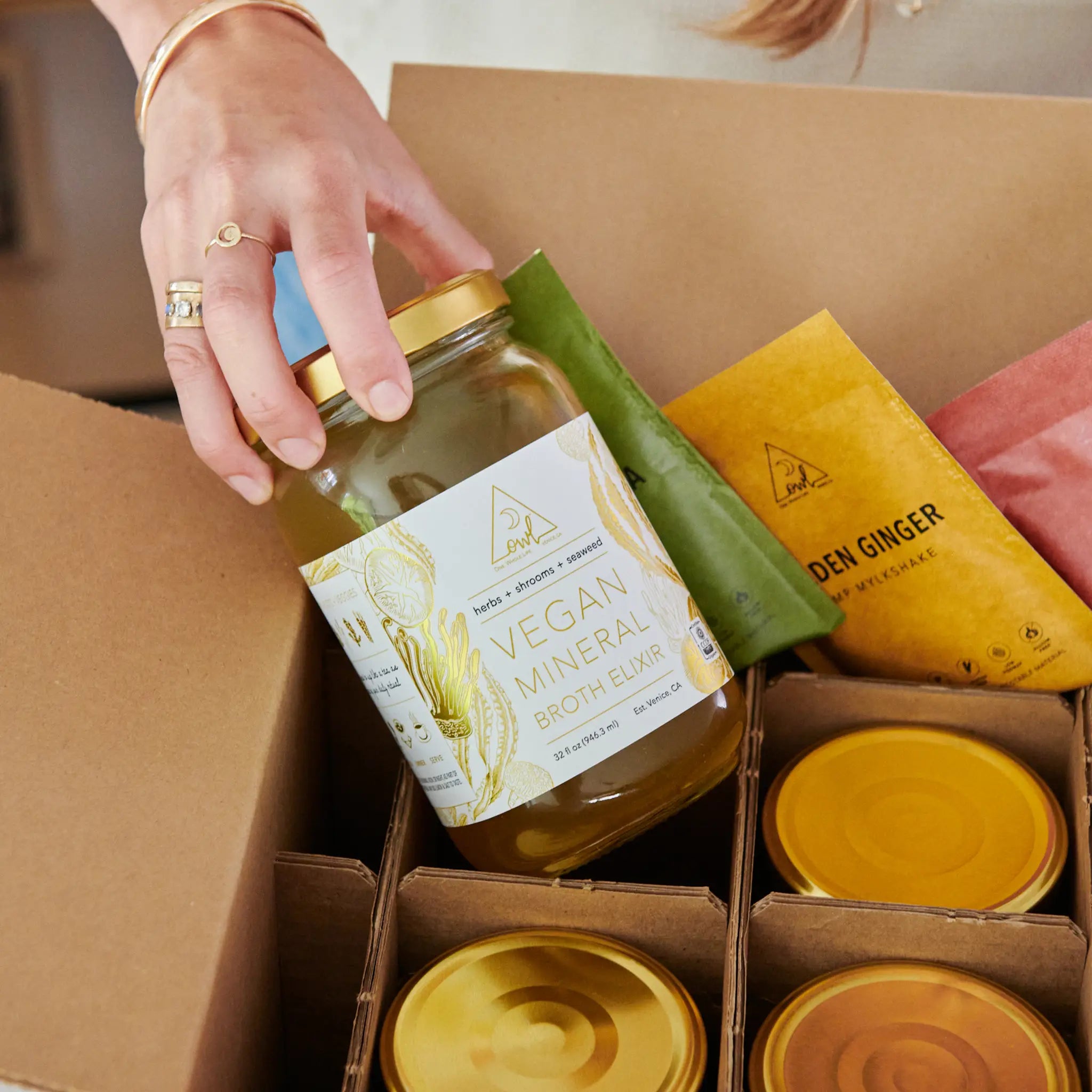OWL Venice The OWL Reset 21-Day Organic Cleanse Program in a clean, minimal package with herbal supplement bottles.
