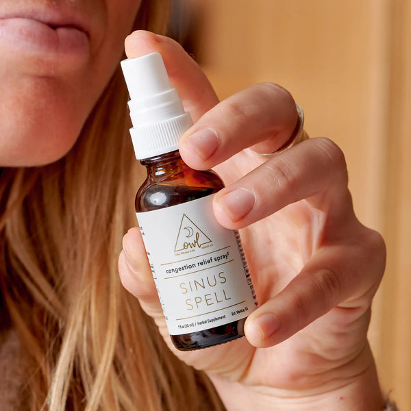 Bottle of OWL Venice Sinus Spell supplement with label visible, designed to support sinus health and respiratory comfort.