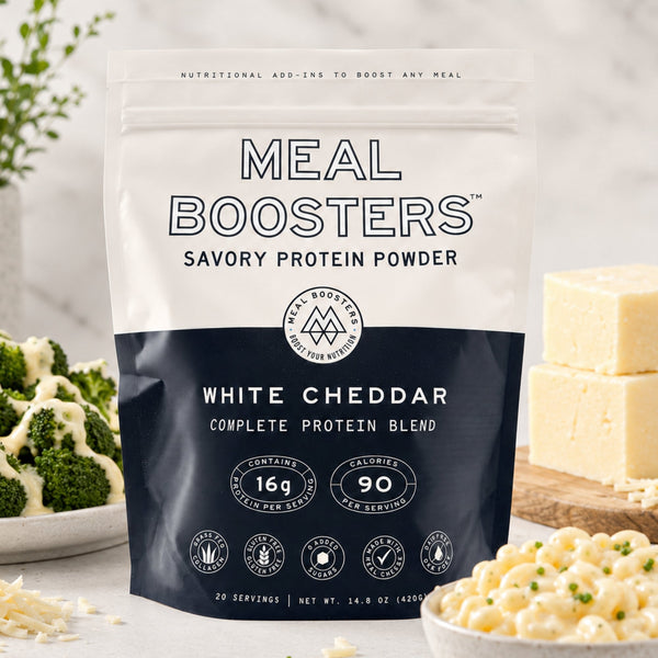 White Cheddar Collagen+ Protein Blend powder by Meal Boosters, showing the resealable bag with product label and nutritional info.