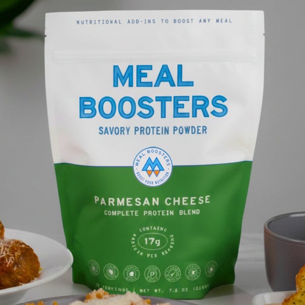 Meal Boosters Parmesan Cheese Collagen Protein Powder blend in a jar, showing the creamy powder texture and label.