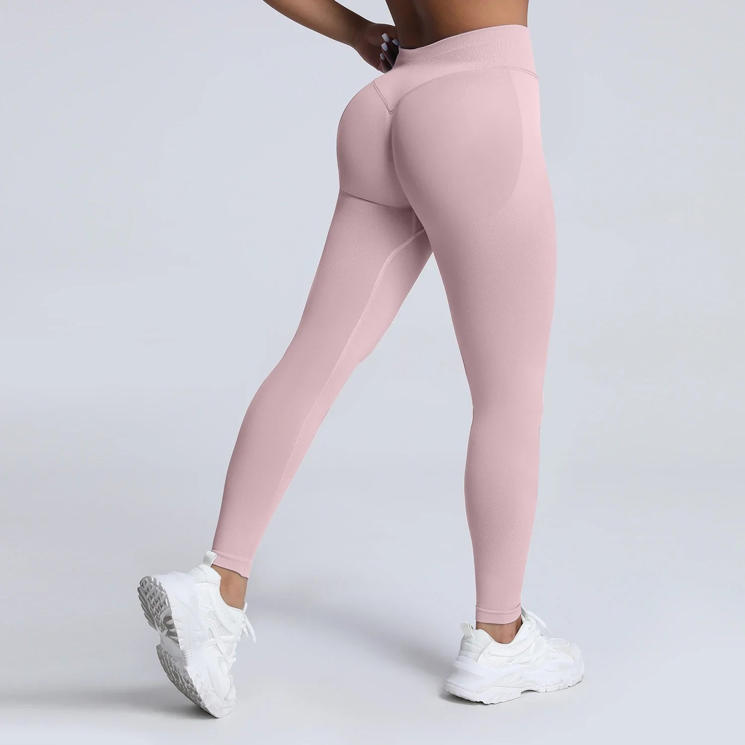 Women's low waist scrunch bum yoga leggings by THRIXINE, featuring a fitted design and stretch fabric for active wear.