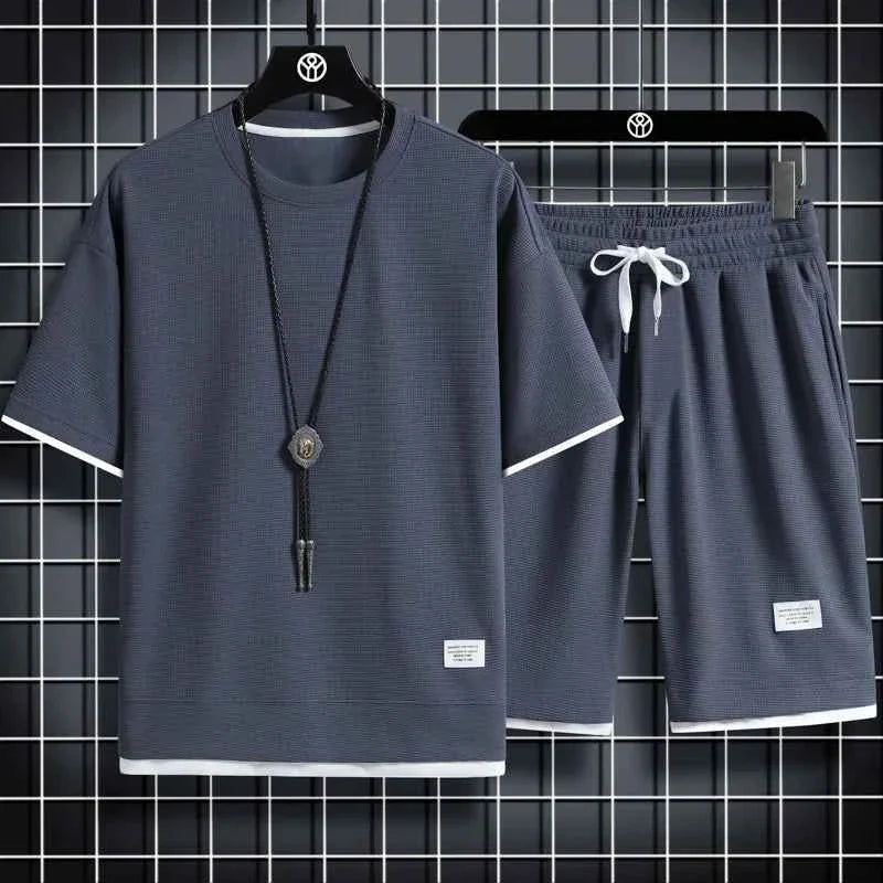 Men's quick-dry summer running set by THRIXINE, featuring breathable fabric and athletic design for active outdoor workouts.