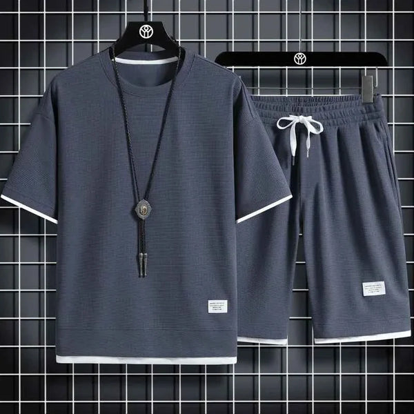Men's quick-dry summer running set by THRIXINE, featuring breathable fabric and athletic design for active outdoor workouts.
