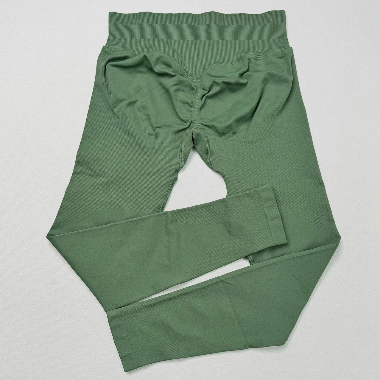 Women’s low waist scrunch bum yoga leggings by THRIXINE, featuring a snug fit and comfortable stretch for active wear.