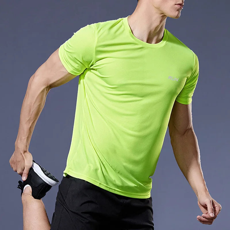 Mandotos men's running shirt featuring quick-dry fabric, compression fit, and sporty design for jogging, fitness, and gym workouts.