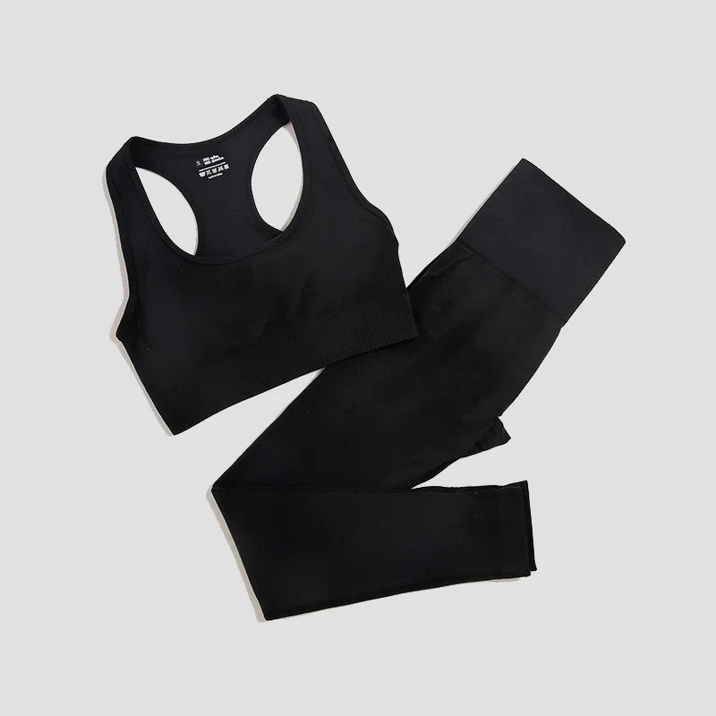 Seamless women's yoga set by THRIXINE featuring a fitted sports bra and high-waisted leggings for activewear.
