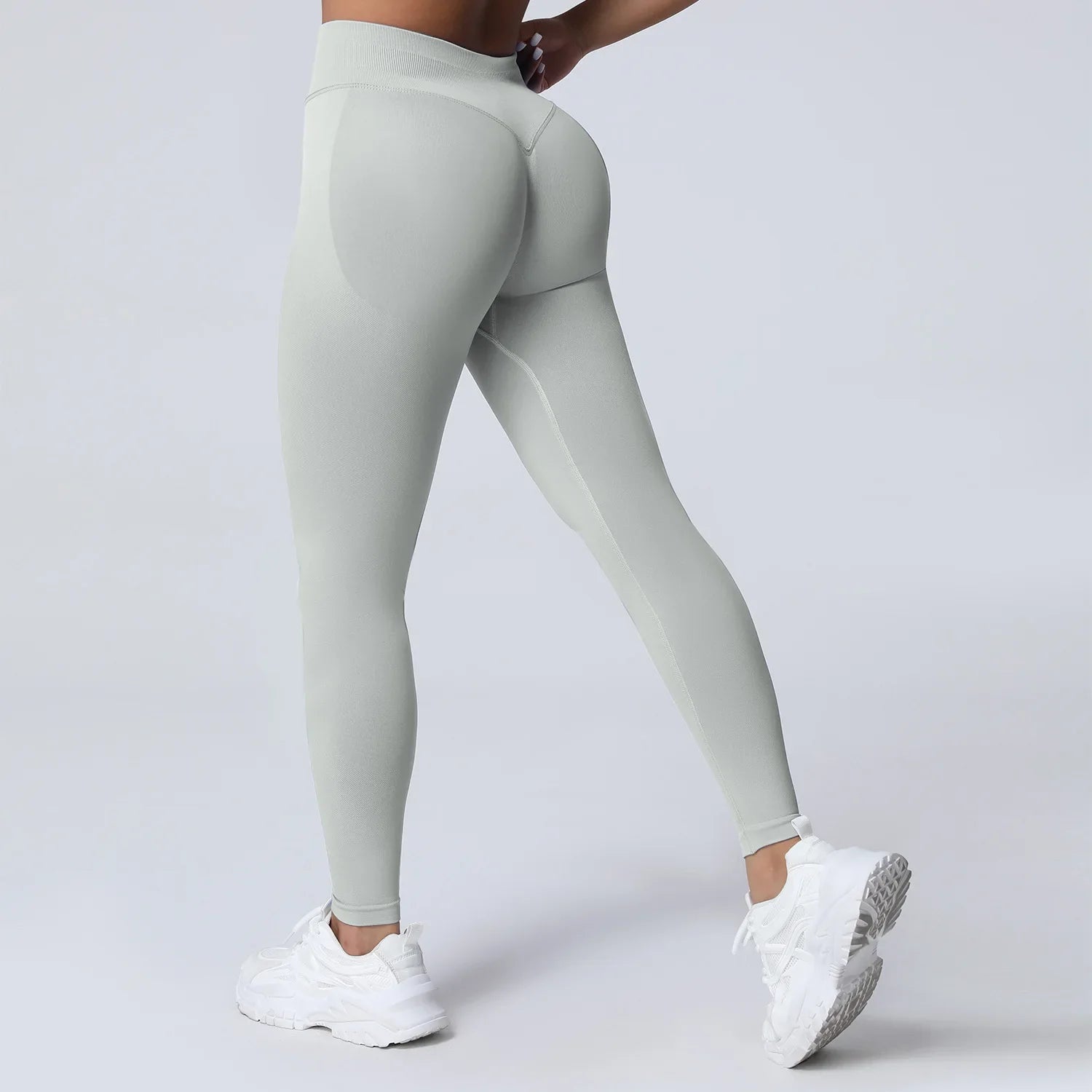 Women's low waist scrunch bum yoga leggings by THRIXINE, featuring a stretchy fit and stylish design for active wear.