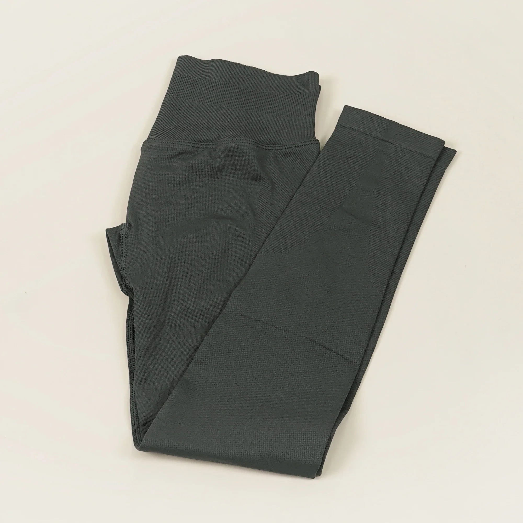 Women's low waist scrunch bum yoga leggings by THRIXINE, featuring a snug fit and flexible fabric for active wear.
