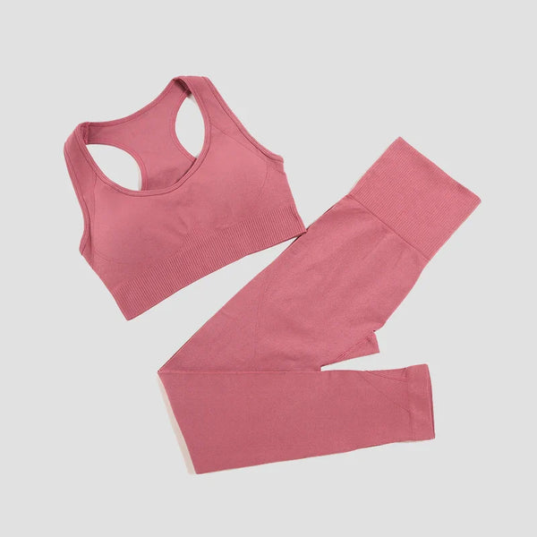 Seamless women's yoga set by THRIXINE, two-piece activewear with fitted leggings and matching sports bra for fitness and yoga.