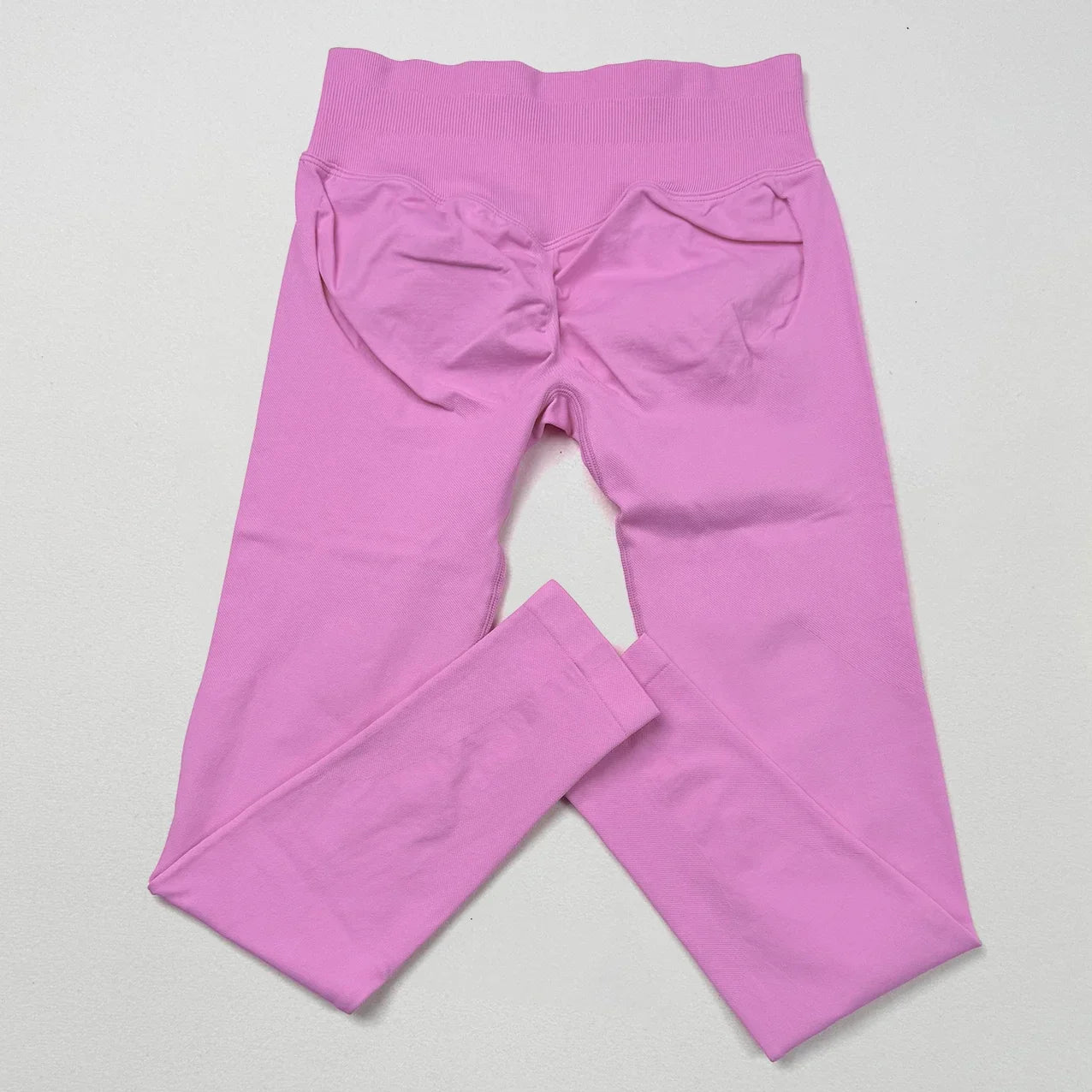 Women's low waist scrunch bum yoga leggings by THRIXINE, featuring a comfortable fit and flattering design.